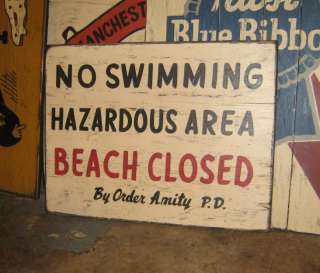 jaws the movie beach closed wood bar sign ocean amity police  