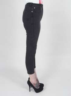 Acid washed black cotton denim, with stretch, features ultra high rise 