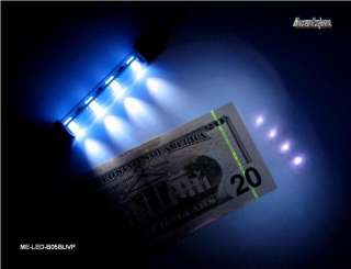   picture shows fluorescent print on $20 bill under this UV illumination