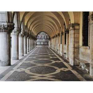 Columns and Archways Along Patterned Passageway at the Doges Palace 
