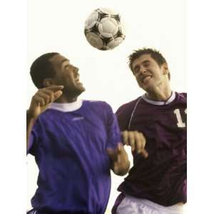  Two Soccer Players Jumping to Head a Soccer Ball Giclee 