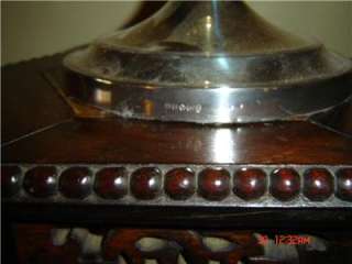   lamp have several silver hallmarks we believe this piece is british