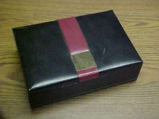 Up for auction here is this vintage black leather men’s jewelry box 