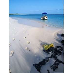  Empty Beach with Snorkelling Gear and Sandy Footprints 