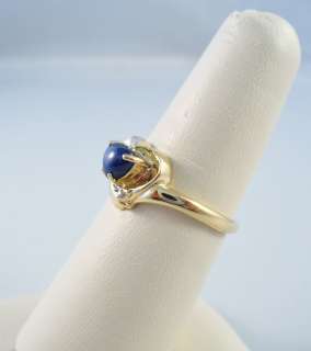   prong setting at the point of the heart ring is in excellent condition