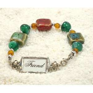  friend charm on jewel colored bracelet 