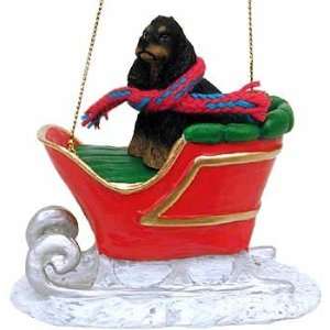  Black and Tan Cocker in a Sleigh Christmas Ornament