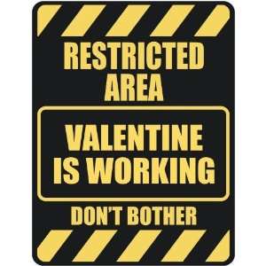   RESTRICTED AREA VALENTINE IS WORKING  PARKING SIGN 