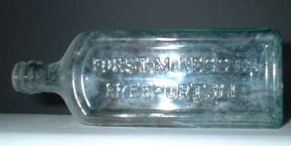 BOTTLE VINTAGE EMBOSSED FURST MCNESS CO. AQUA GLASS EARLY SCREWTOP 
