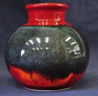 We have on offer a contemporary Poole vase, in orange and red glaze 