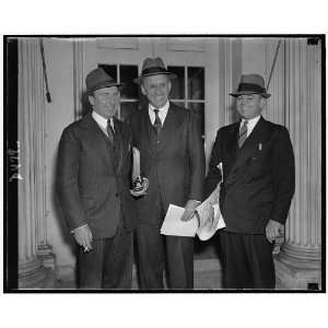   to right Asst. Secy. of Treasury John W. Hanes, Secy.