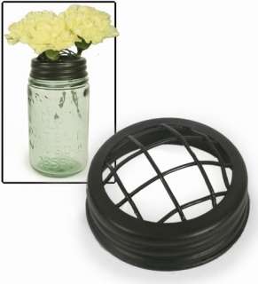   are three different size mason green glass jars with two lids a