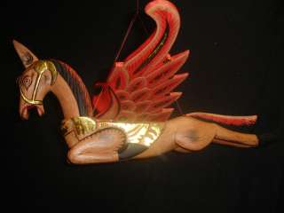 is hand carved in bali by talented crafts people traditional folk art 