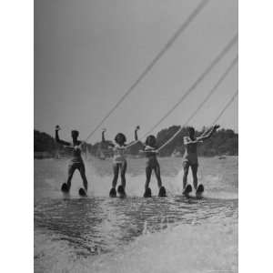  Four People Competing in the National Water Skiing 